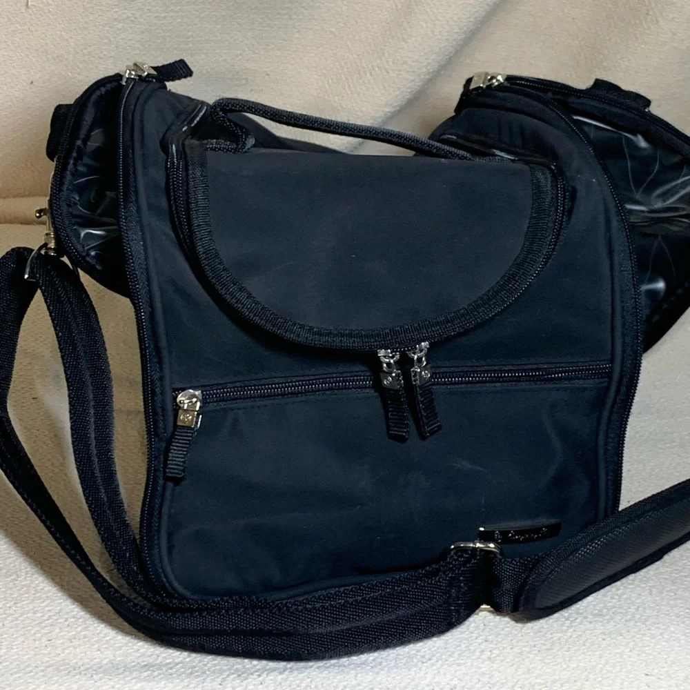 black travel bag for make up or toiletries